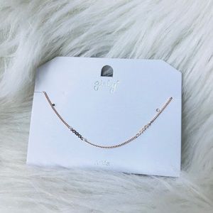 Dainty gold anklet with 3 etched stars.